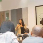 Napa Onwusah leading a session with outcome-driven learning for professionals.