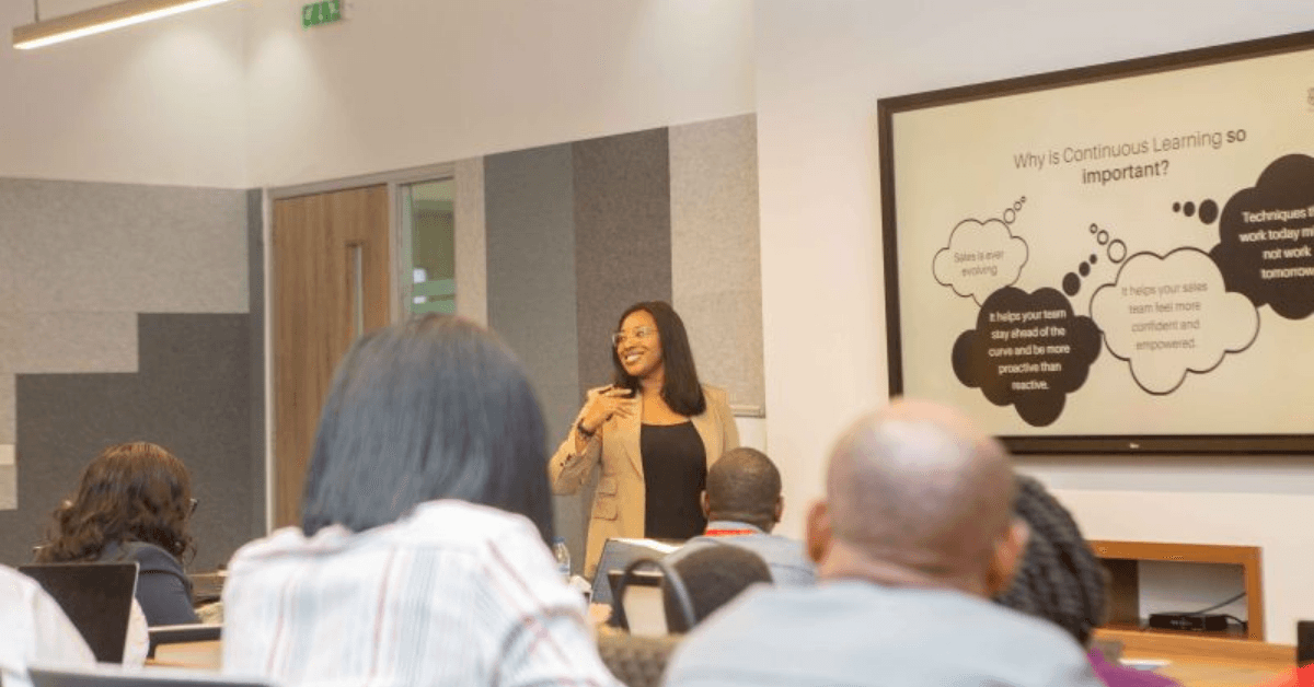 Napa Onwusah leading a session with outcome-driven learning for professionals.